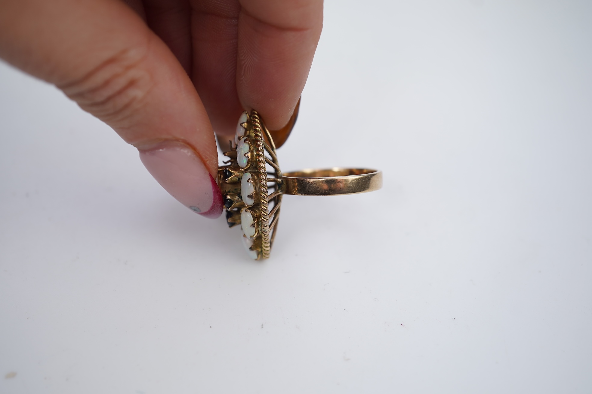 Two 19th century white metal mounted horn snuff mulls, one engraved 'John Calder', the other with inset tiger's eye quartz cabochon, both a.f., largest 83mm.